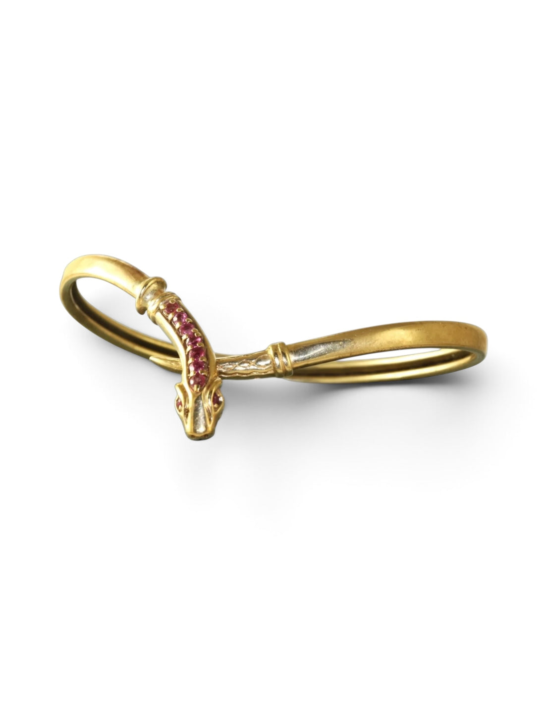 Full view of a vintage ruby snake bracelet in acid-tested gold with a flexible wrap design and sculpted serpent motif.
