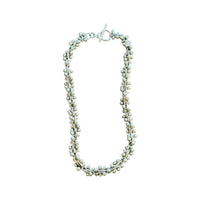 Full view of an 18-inch vintage sterling silver peppercorn necklace with toggle closure and chunky bead ball helix links.