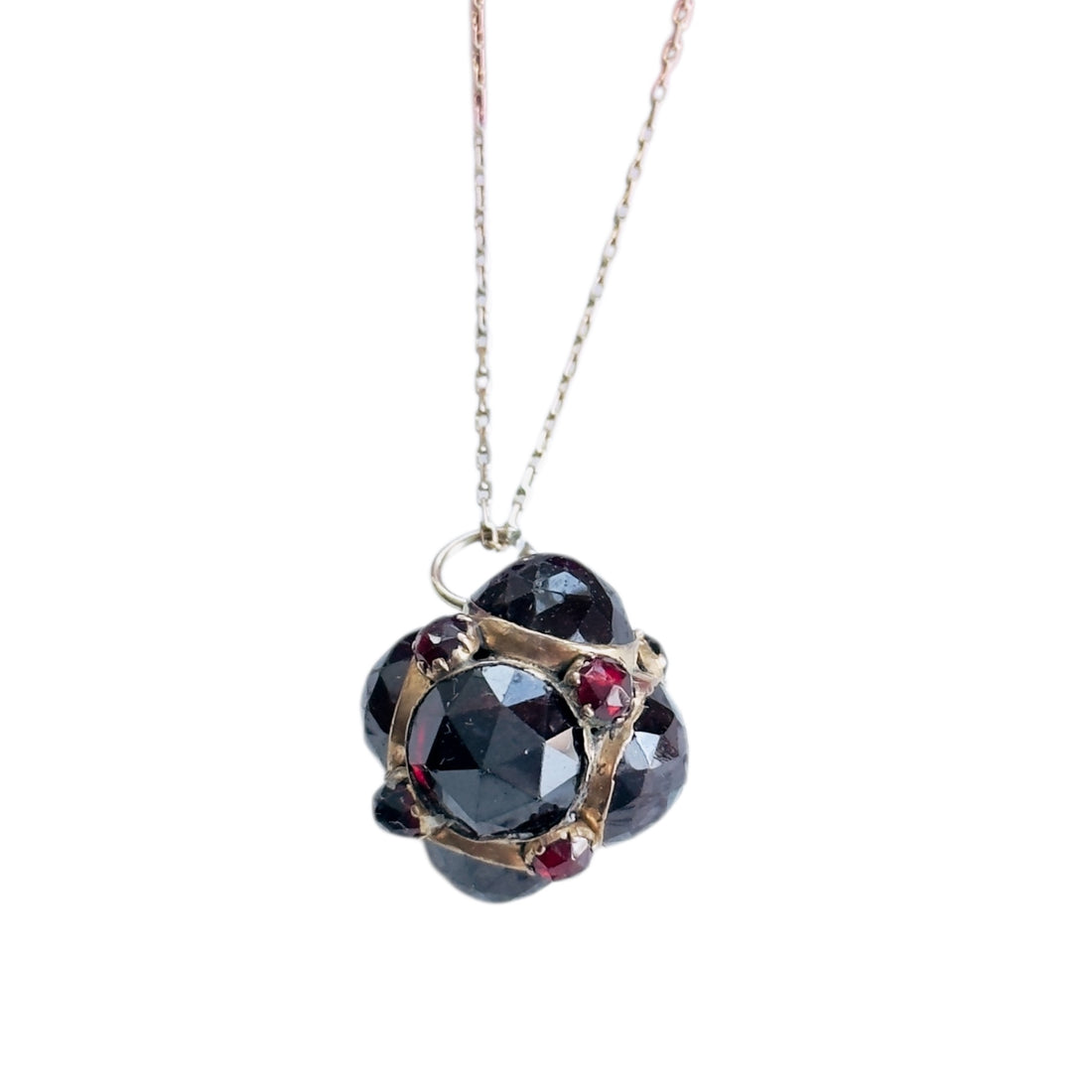 Garnet orb necklace with faceted garnets set in 14k gold