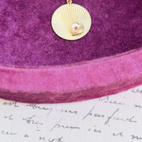 Gold fluted disc pendant on 14k paperclip chain