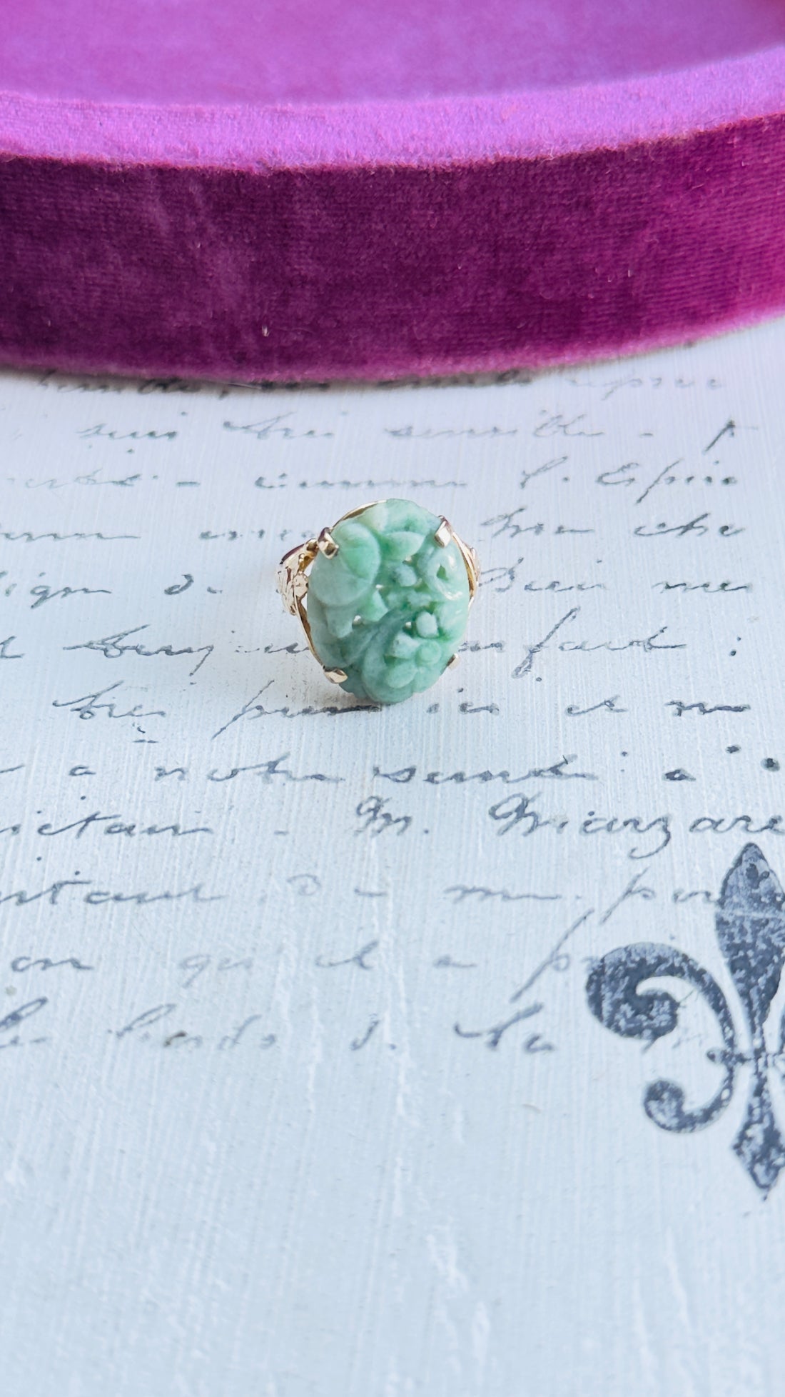 Hand-carved jadeite ring in 14k yellow gold openwork mounting
