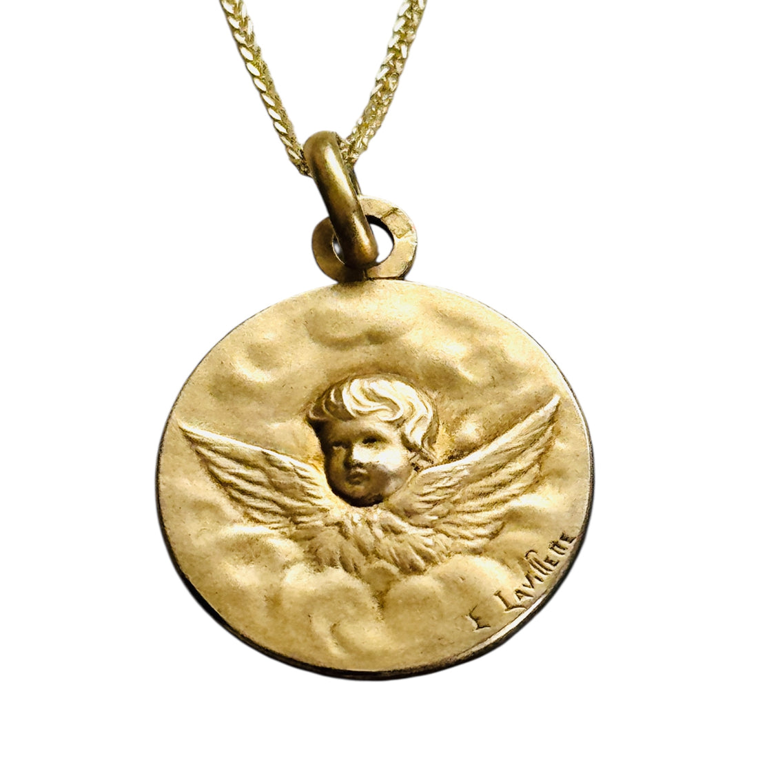 High-relief winged cherub detail on antique French Art Nouveau FIX medal.