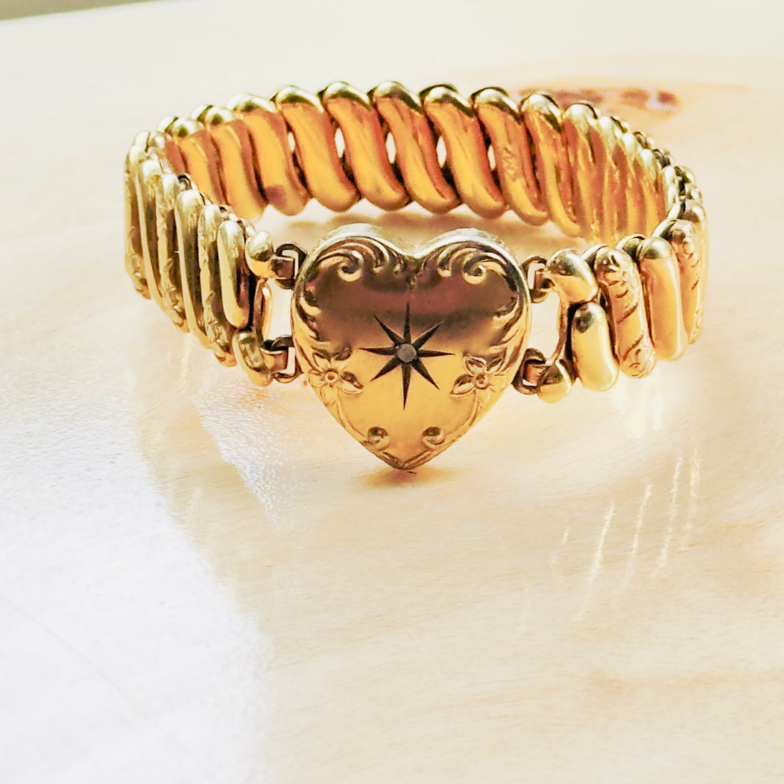 Mid-century Marathon signed gold-filled expansion bracelet with domed heart center and diamond starburst detail