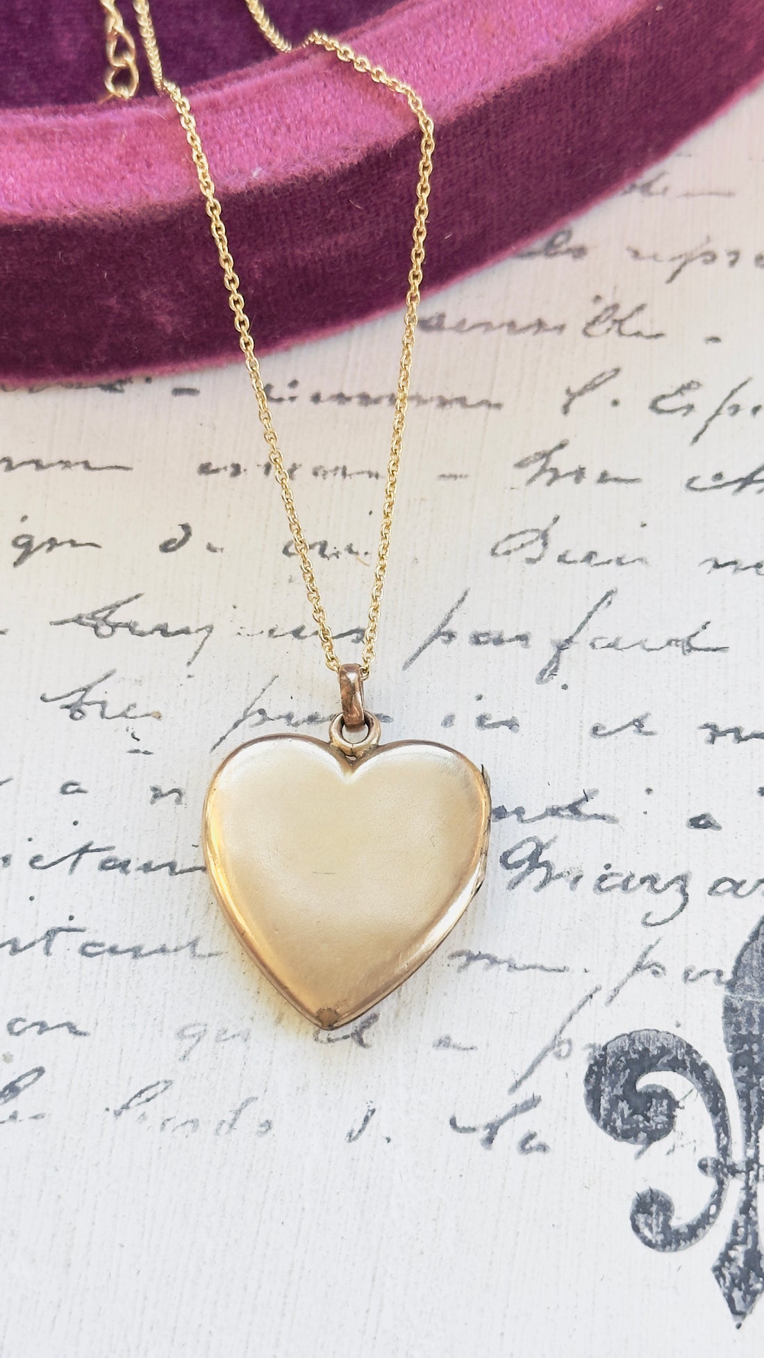 reverse of locket, plain no monogram