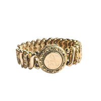 Original Carmen gold-filled sweetheart expansion locket bracelet featuring an engraved A monogram and expandable band.