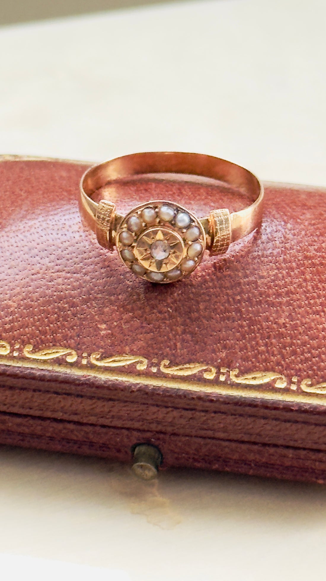 Rare French goldsmith ring in 18K rose gold with star setting and seed pearls
