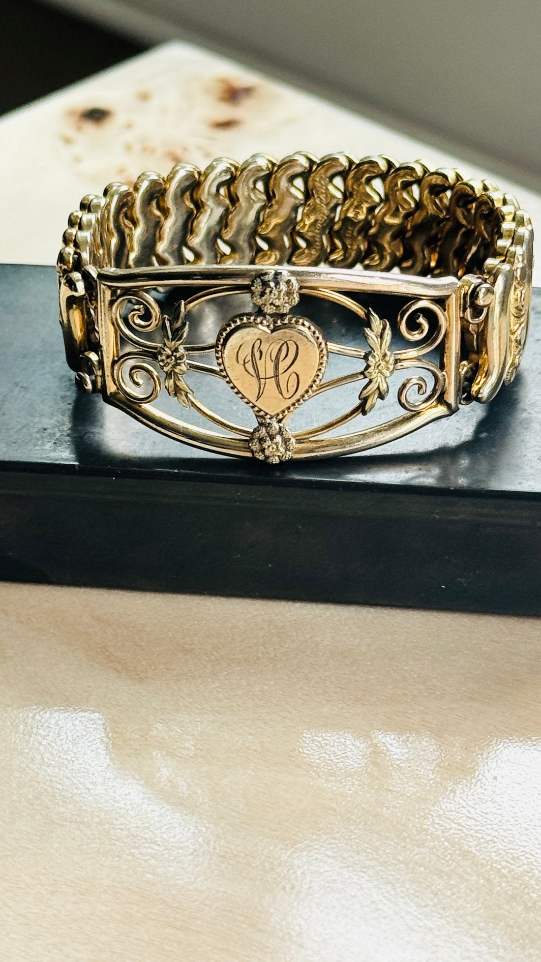 Side view of Leading Lady sweetheart bracelet showing heart medallion and expansion links"