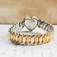 Signed Co-Star gold filled heart face expansion bracelet with leaf and floral engraving, vintage condition