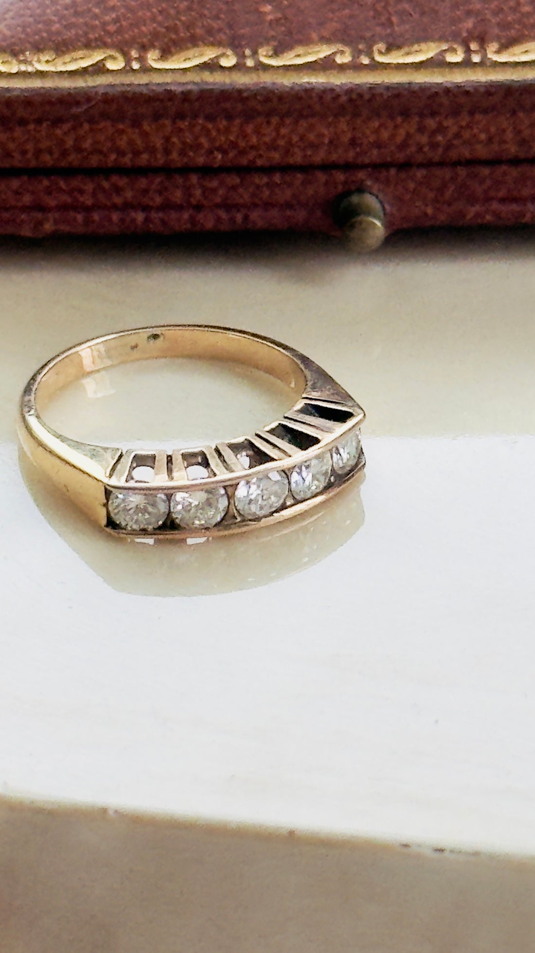 Stackable vintage diamond band in 14K rose gold with geometric stepped shoulders