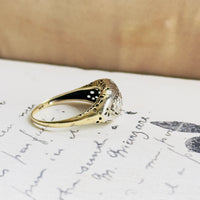 Two-tone gold vintage diamond ring with delicate openwork side details