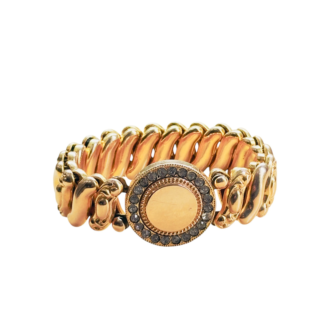 Unsigned vintage gold filled sweetheart expansion bracelet with full paste stone rhinestone halo and smooth center disc, mid-century American jewelry
