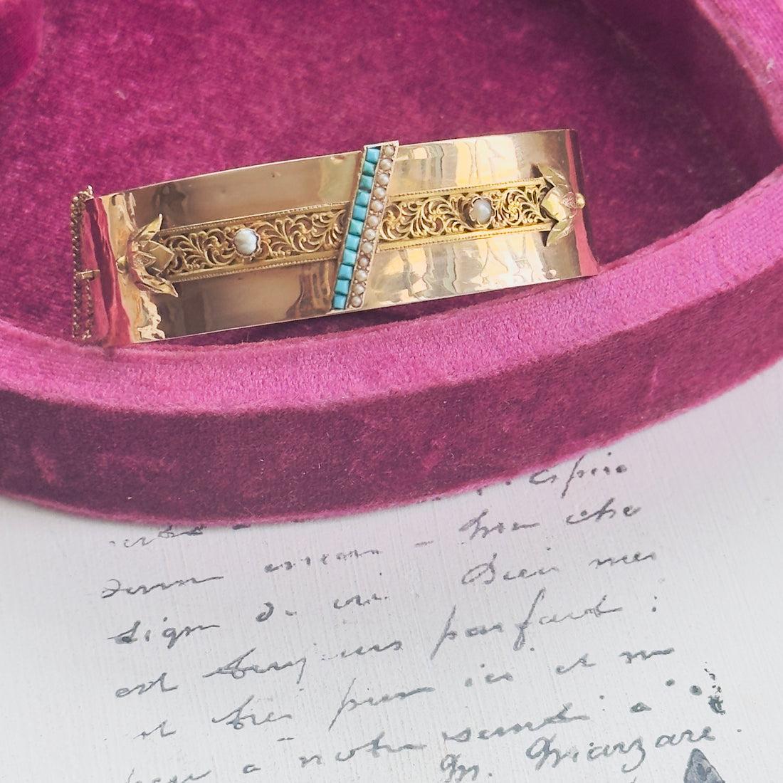 Victorian 18k gold hinged bangle bracelet featuring turquoise and seed pearls