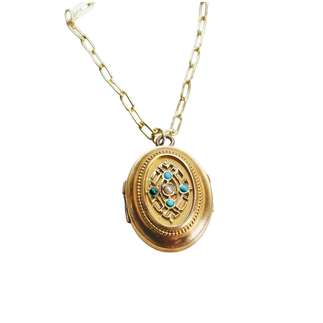 Victorian 18k gold oval locket with turquoise and seed pearl on white background