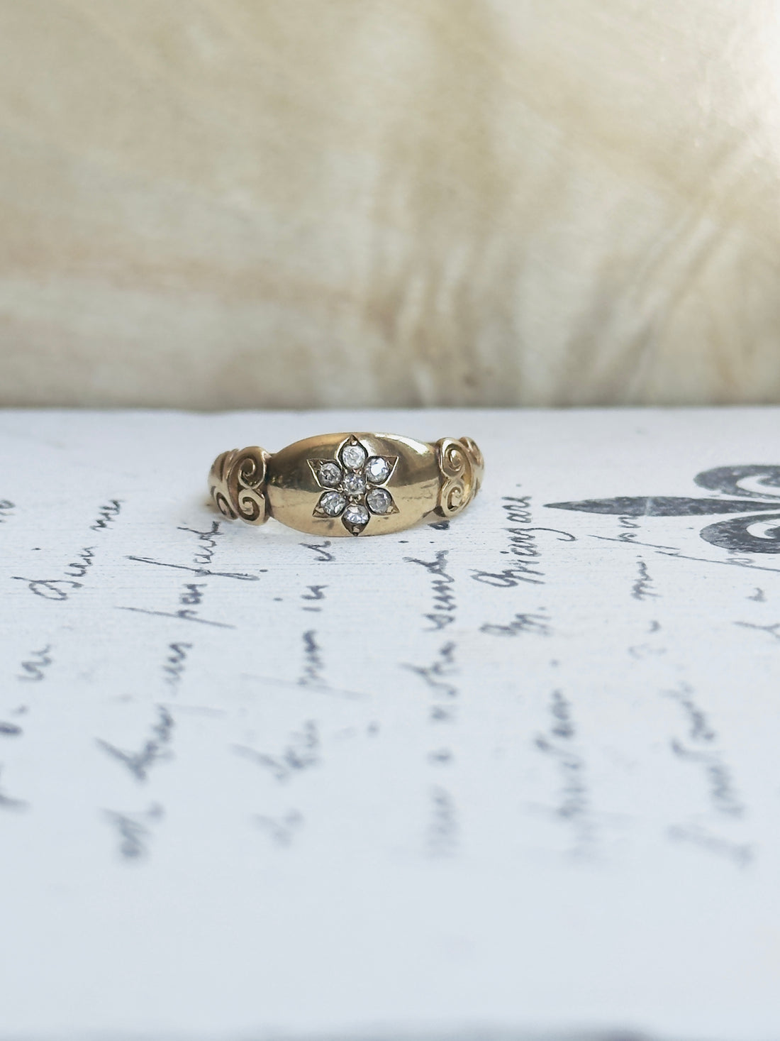 Victorian gold ring with hand-engraved scroll shoulders and diamond cluster face, one of a kind antique ring