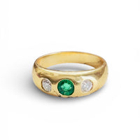 Vintage 14k gold emerald and diamond gypsy band by Cresarrow