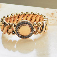 Vintage American sweetheart expansion bracelet, gold filled with paste stone halo face and puffy oval link expansion band, unengraved center