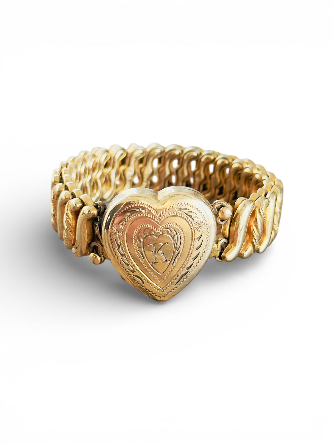 Vintage Carmen D.F.B. Co. gold-filled sweetheart locket bracelet engraved with “K” monogram.