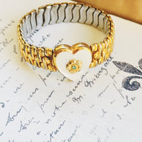 Vintage Co-Star sweetheart bracelet with mother-of-pearl heart and gold expansion band