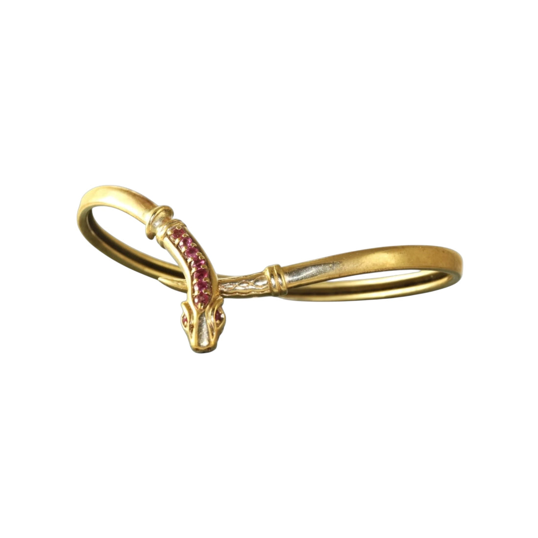 Vintage ruby snake bracelet in acid-tested gold featuring nine natural rubies and a flexible wrap design.
