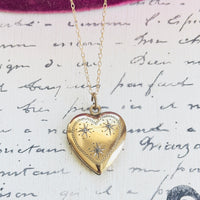Vintage sentimental heart locket with celestial diamond accents