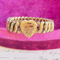 Vintage sweetheart bracelet by Bigney with engraved floral heart detail