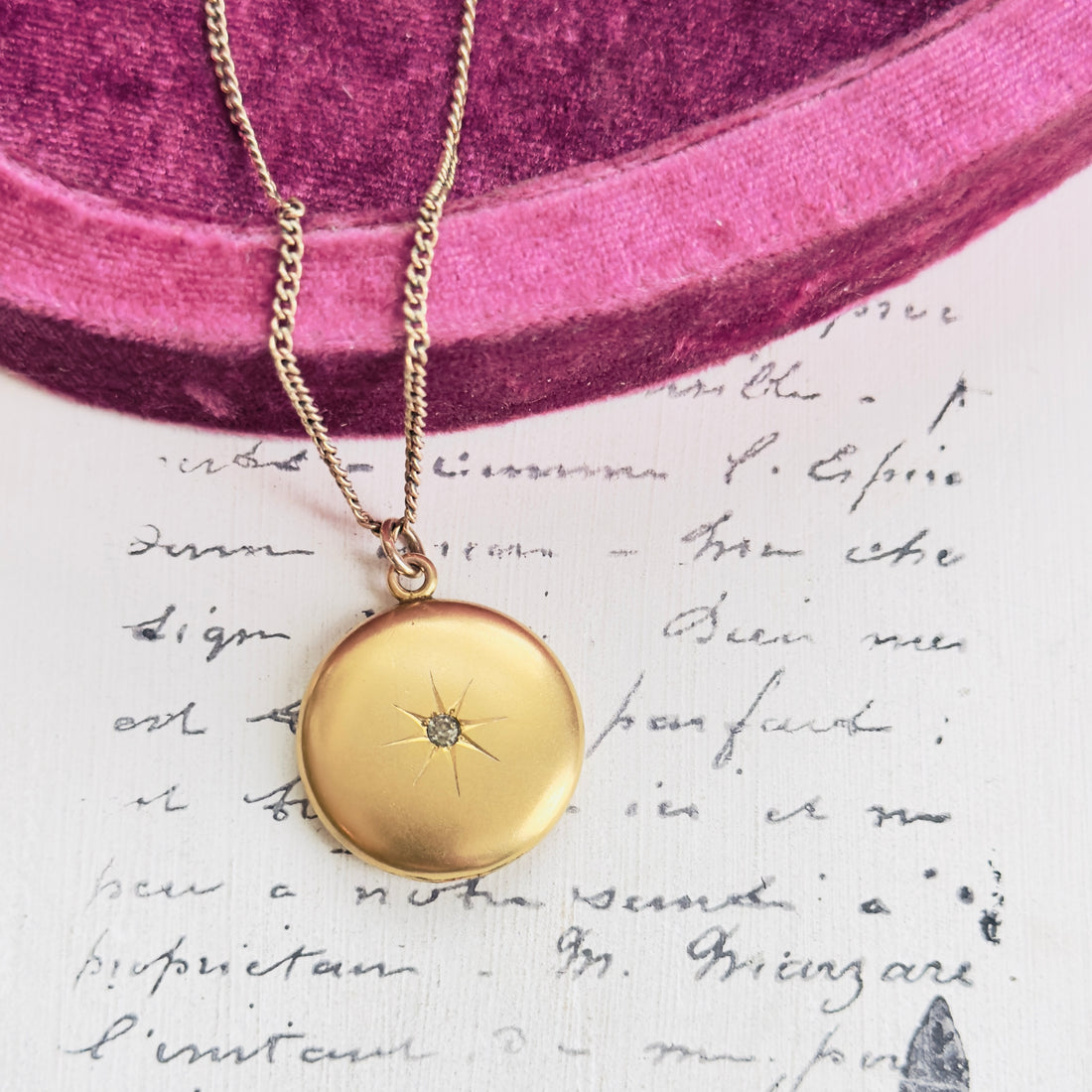 W.H. & Co. gold-filled round locket on original chain