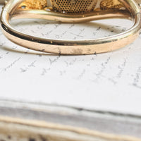 Back view of Edwardian gold filled hinged bangle bracelet showing the 6.78mm band and reverse of the lion head