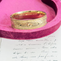 hipV antique Dunn Bros Taille d’Épargne bangle featuring black enamel and floral design.