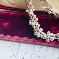 Video of vintage sterling silver peppercorn necklace highlighting the movement, texture, and toggle clasp.