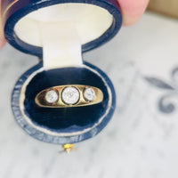 Video preview of a hand opening a box to reveal an antique diamond ring