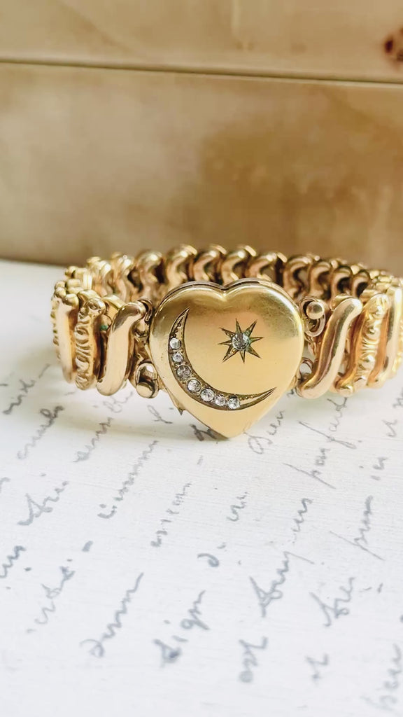 Video of a vintage Carmen gold-filled sweetheart bracelet showing the crescent moon and star locket and flexible expansion band