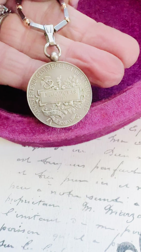 video of reverse side of coin necklace