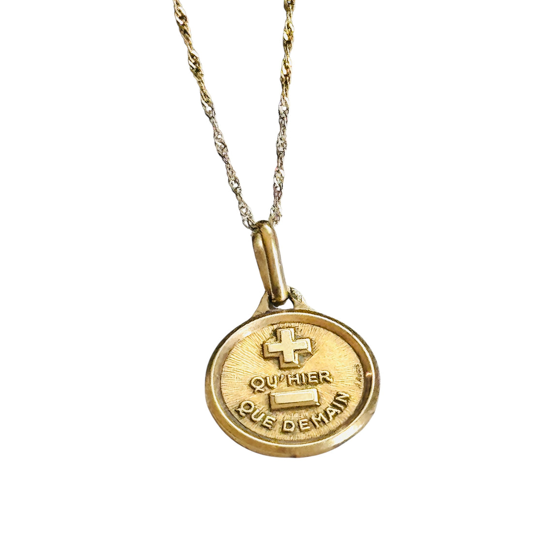 rench Love Token by Alphonse Augis in 18k gold paired with an 18-inch 14k gold chain.
