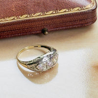 three-stone diamond band in 14K gold with H color VS2 clarity stones

