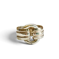 Tiffany & Co. Atlas sterling silver ring with three ribbed bands and an open loop, on a white background