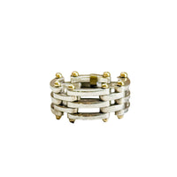 Front view of the Tiffany Gate Link ring showing three rows of hinged silver links and gold beads