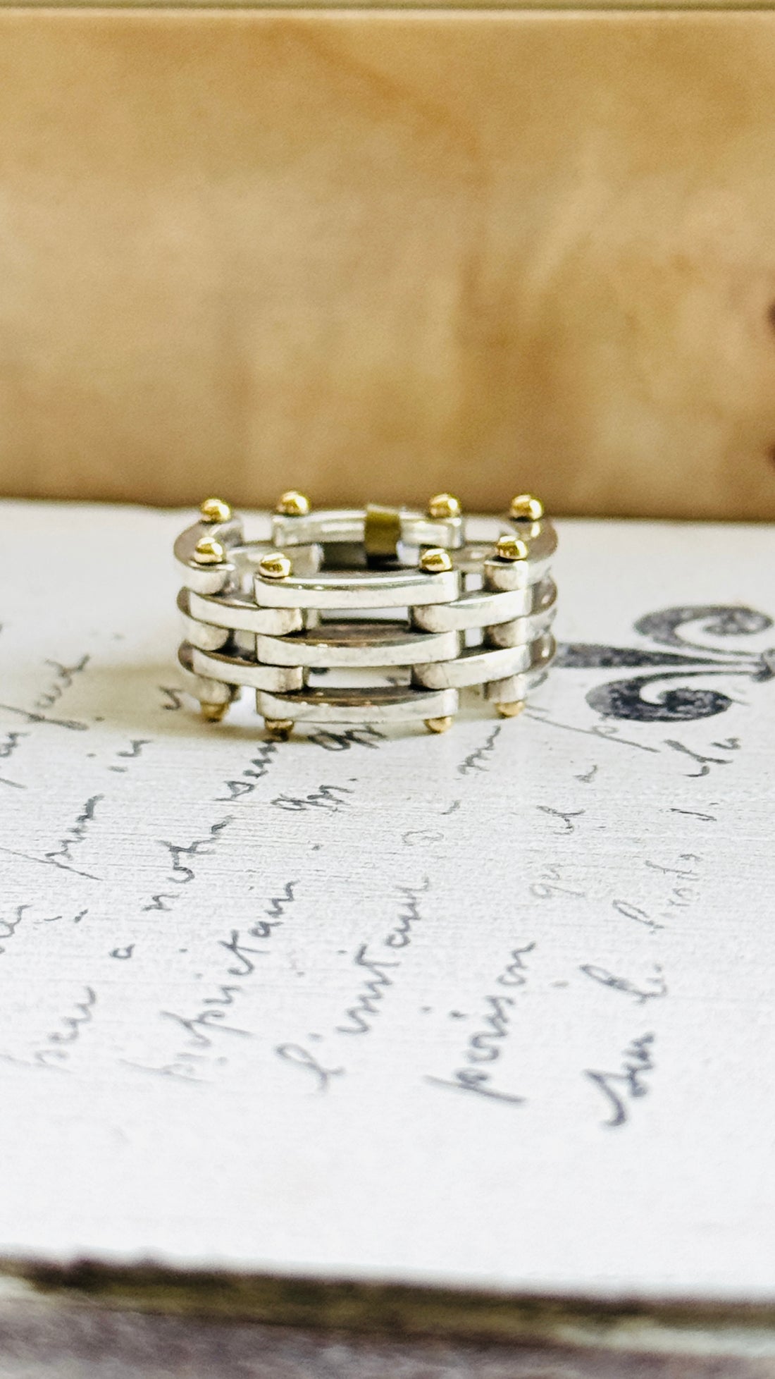 Tiffany Gate Link ring styled on vintage script paper