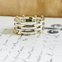Tiffany Gate Link ring styled on vintage script paper