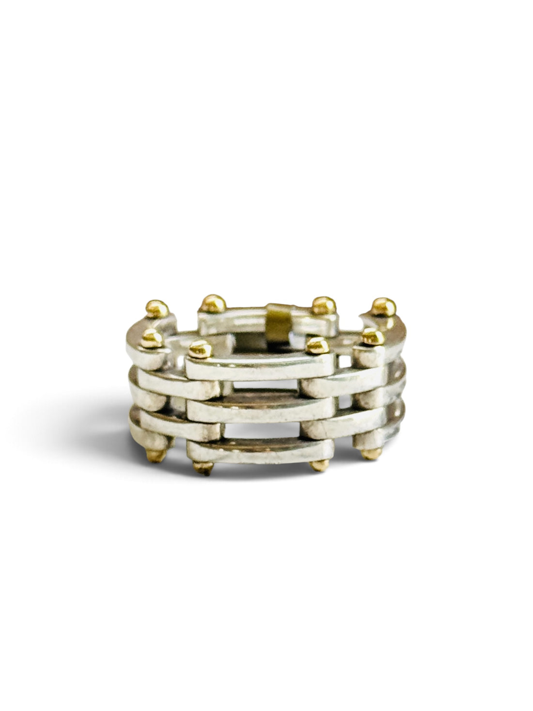 Tiffany & Co. Gate Link ring in sterling silver with 18k gold beads, on a white background