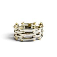 Tiffany & Co. Gate Link ring in sterling silver with 18k gold beads, on a white background