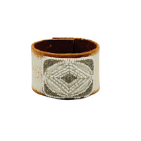 Vintage beaded shoe buckle married to this great leather cuff. 