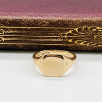 Vintage gold signet ring with oval flat top perfect for engraving monogram.