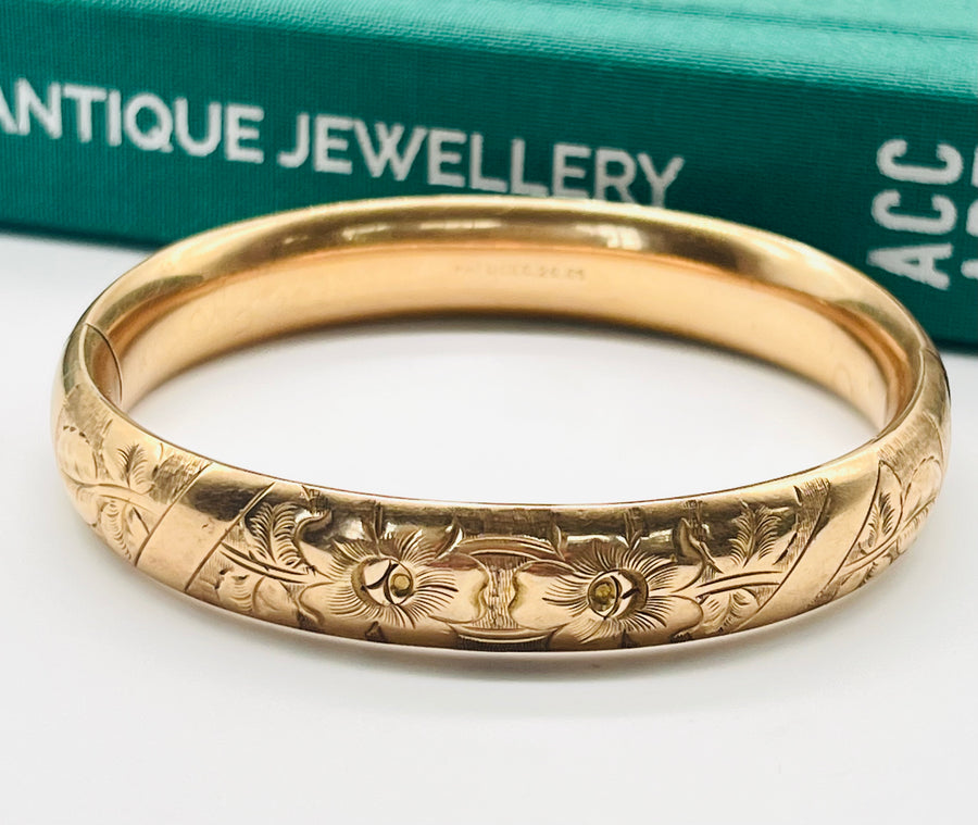 Vintage gold-filled antique bangle bracelet with floral design.