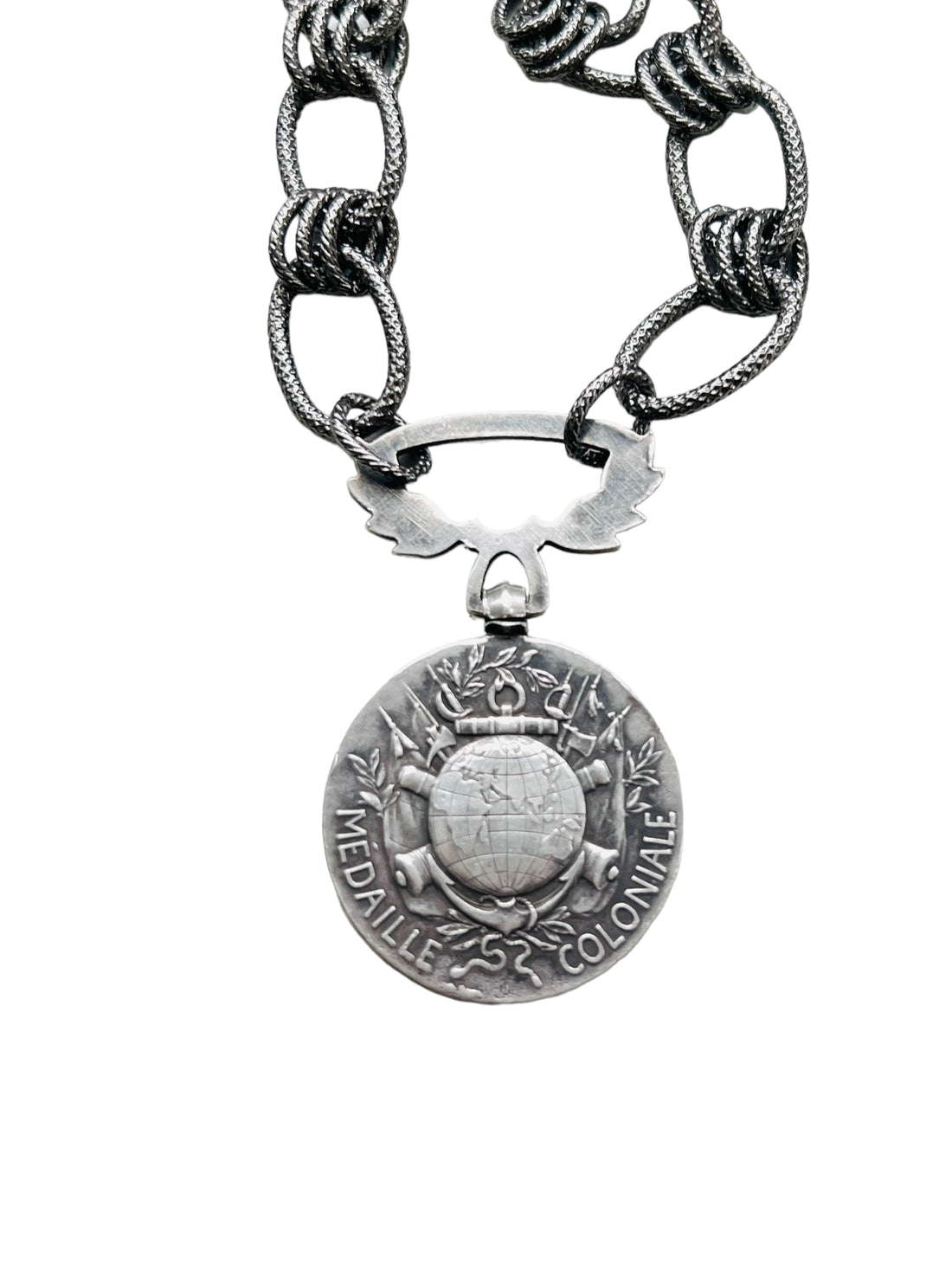 Coin Necklace featuring a helmeted bust on one side with a globe on the reverse