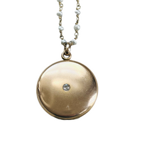 Minimalist jewelry featuring antique round locket with monogram by hipV Modern Vintage Jewelry. 