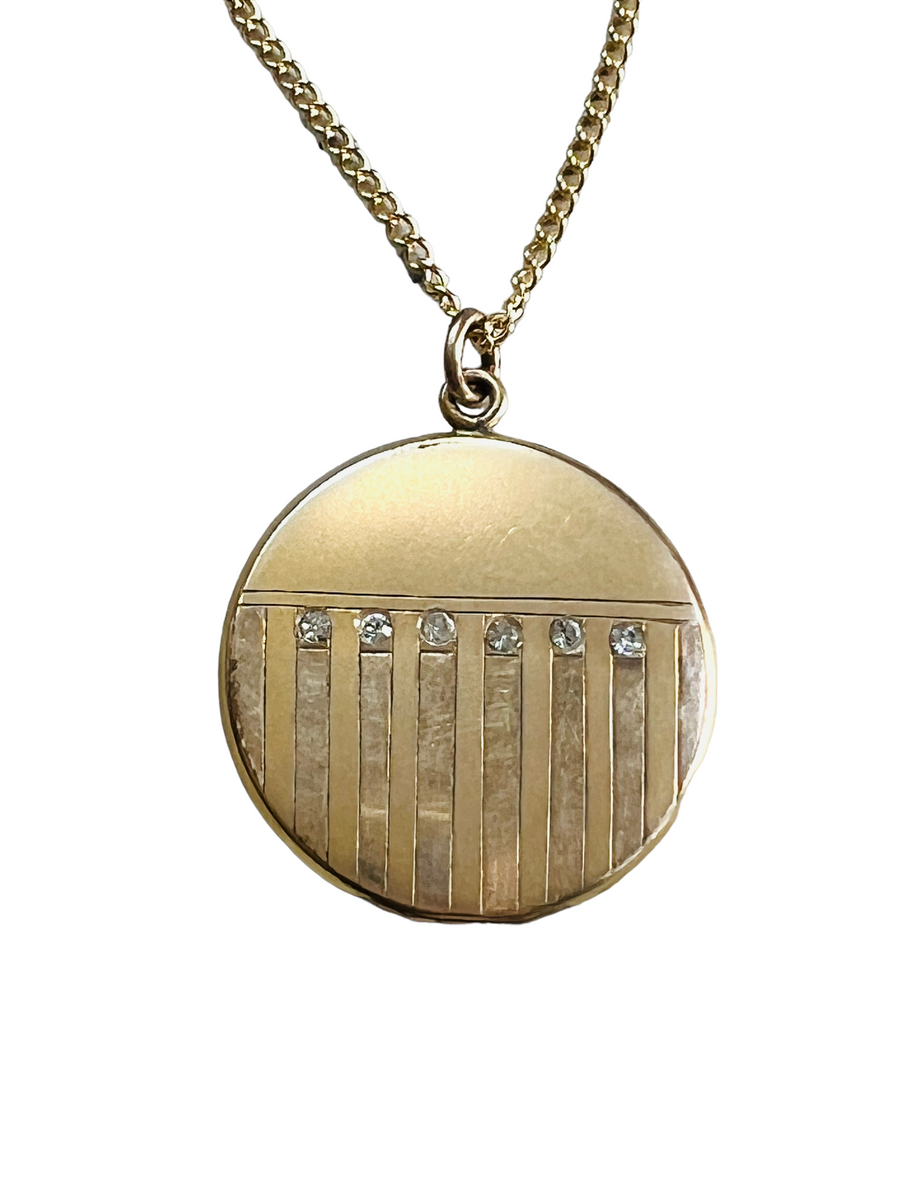 Art Deco Jewelry featuring gold filled vintage necklace with Art Deco design.